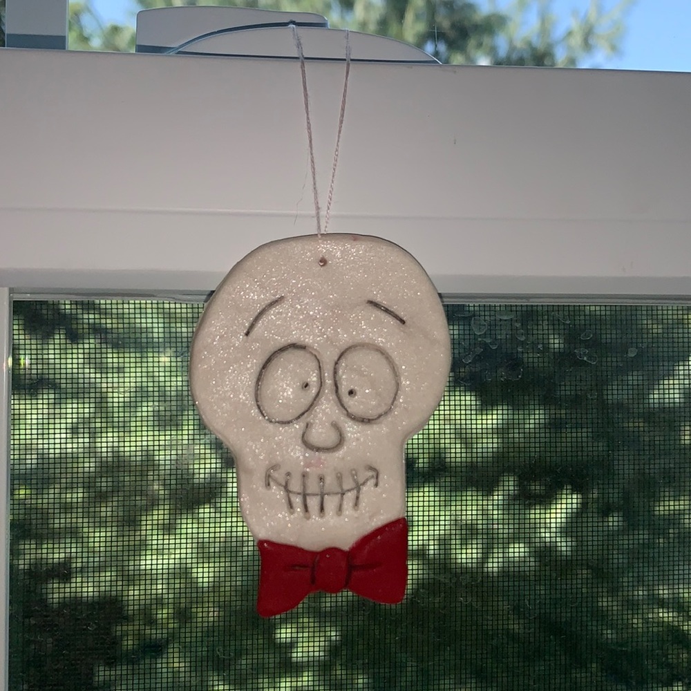 Spooky skeleton clay ornament
